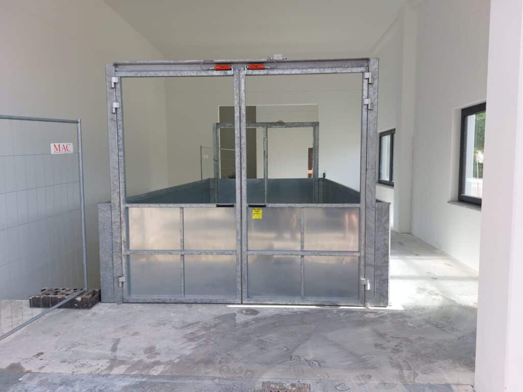 Gates closed and railings at the upper stop