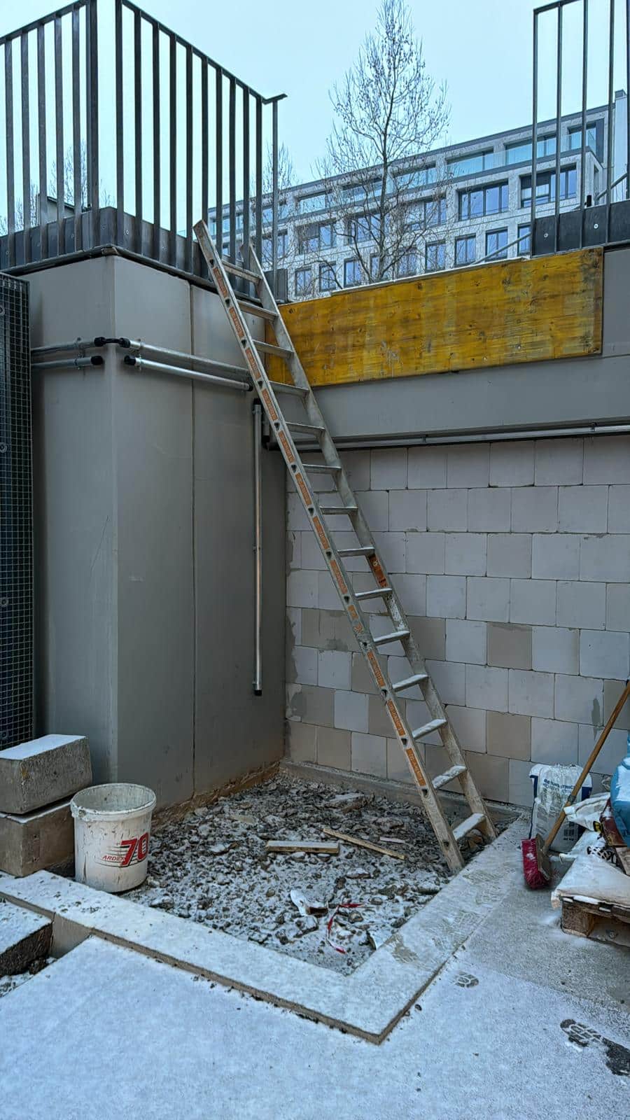 Pit and railing at the top prepared by the customer